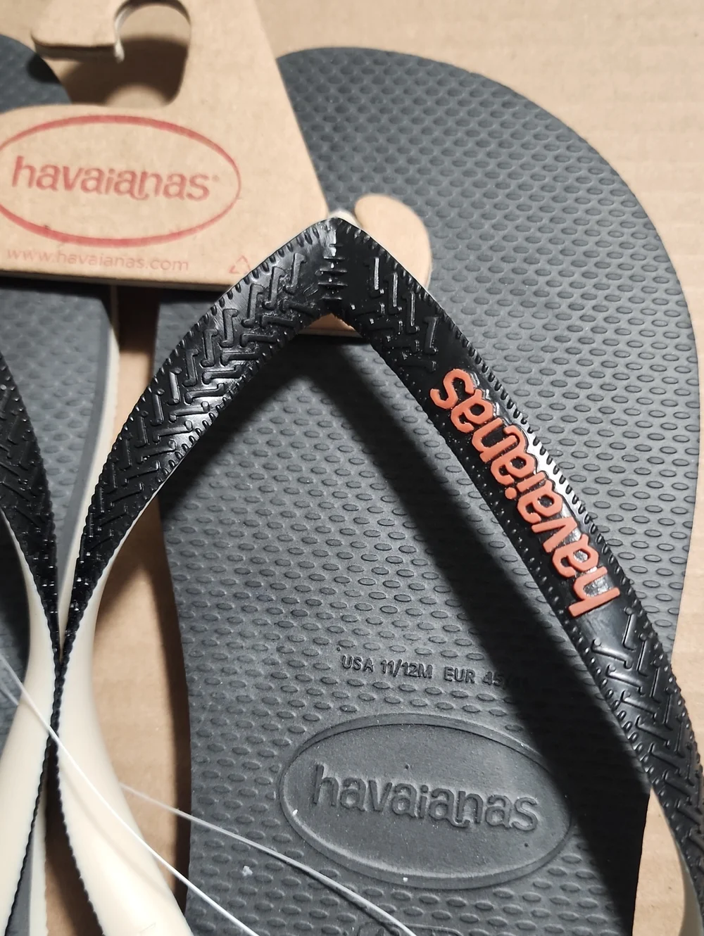 Havaianas Flip Flops - Charcoal Gray Footbed with Cream Straps and Orange Logo